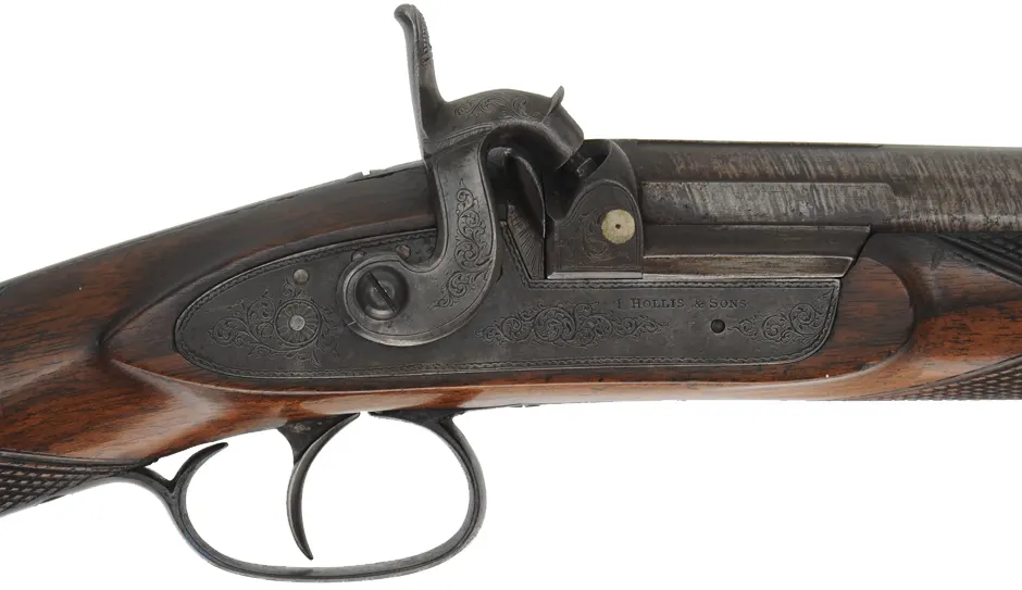 Antique English Fowling Gun
15 gauge, 27-5/8" tapered round barrel, 
percussion, checkered walnut, iron,
by I. Hollis & Sons
