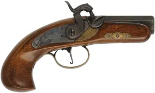 Philadelphia Derringer,
.45 caliber, 2-3/8" barrel, 
brass trim, assembled from a kit, used,
by Jukar