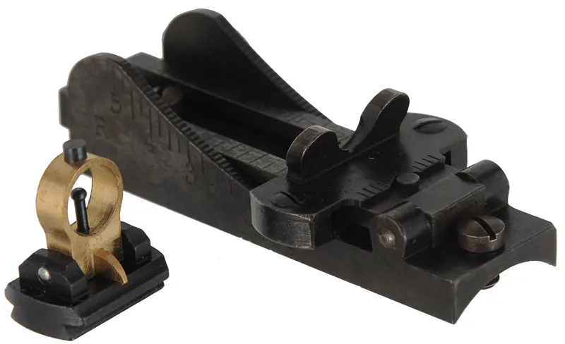 U. S. Model 1873 Officer's Rifle,
caliber .45-70 Government, 26" barrel,
walnut, iron, beach's front sight, tang sight, 
used, by Harrington & Richardson