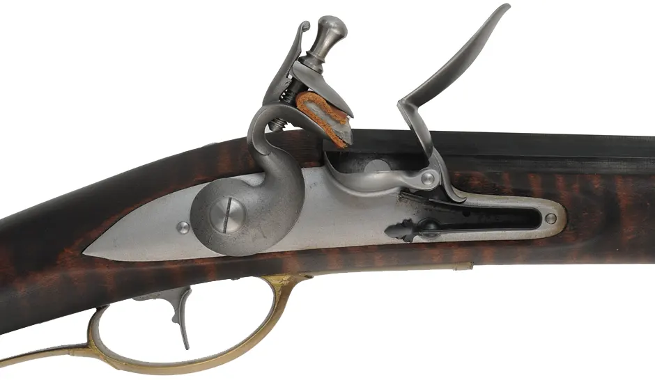 Virginia Valley Longrifle,
.50 caliber,  39-3/4" swamped barrel, 
round faced flintlock, curly maple, brass,
needs final polishing 