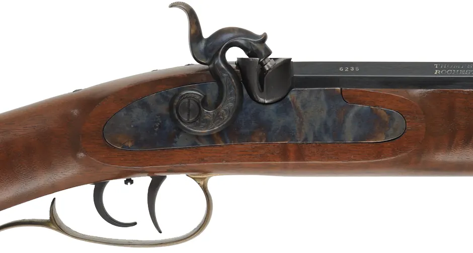 Thompson Center Seneca Rifle,
.36 caliber, 27" barrel,
percussion, walnut, brass, 
fiberglas ramrod, dismounted T/C peep sight, used