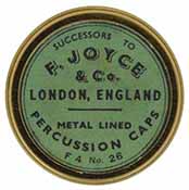 Cap box, 1-3/4" diameter, 
empty, with antique style label marked, 
F. Joyce & Co London England Metal Lined Percusison Caps F4 No. 26